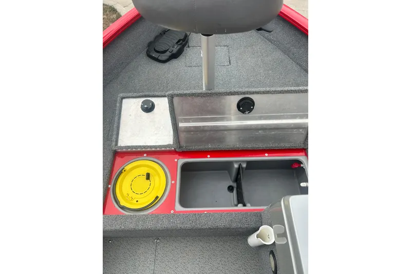 Slide: The Image of 2016 Tracker Pro Guide V-16 SC boat interior with storage compartments and seating. - 22