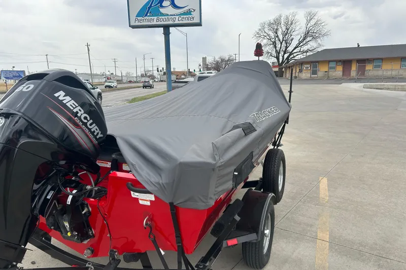 Slide: The Image of 2016 Tracker Pro Guide V-16 SC boat with cover and Mercury engine at Premier Boating Center. - 9