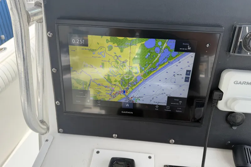 Slide: The Image of Garmin navigation display on 1997 Regulator 26 Center Console boat dashboard. - 20
