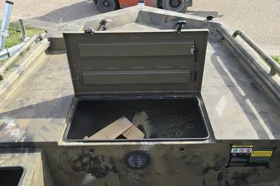 Slide: The Image of Open storage compartment on 2026 Havoc 1860 DBST boat, showcasing interior space. - 6