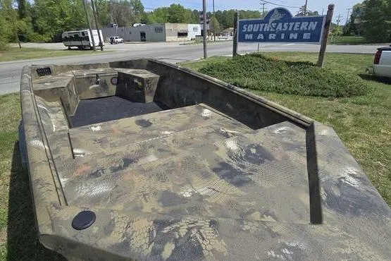 Slide: The Image of 2026 Havoc 1860 DBST boat with camouflage design at Southeastern Marine dealership. - 9