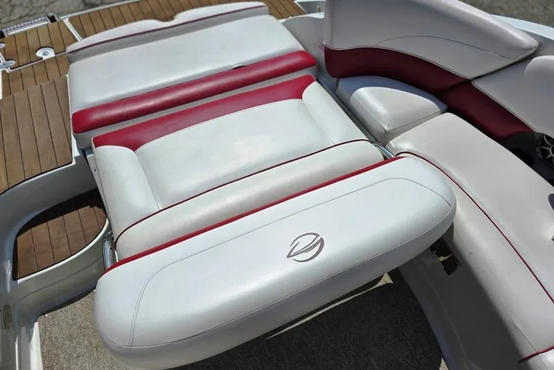 Slide: The Image of 2012 Crownline Eclipse E4 boat interior with white and red cushioned seating. - 12
