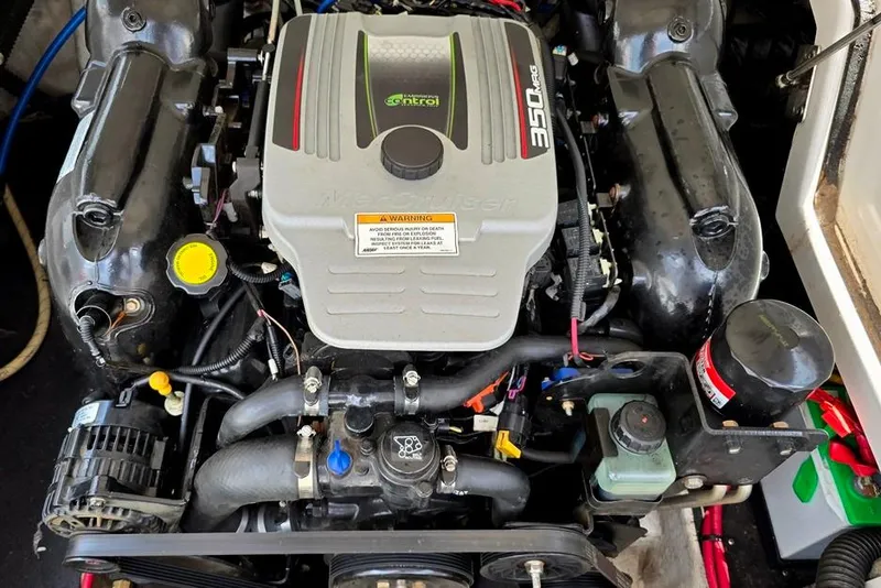 Slide: The Image of Engine of a 2012 Crownline Eclipse E4 boat, featuring a 350 MAG motor. - 18