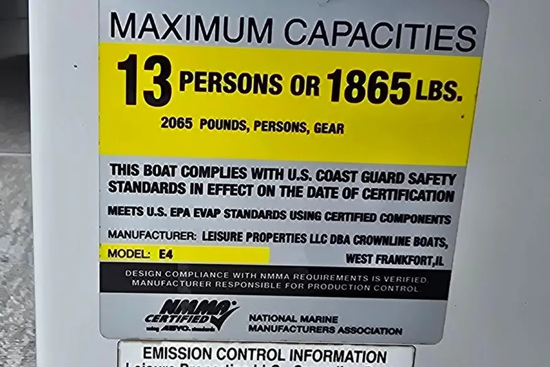 Slide: The Image of Capacity label for 2012 Crownline Eclipse E4, 13 persons or 1865 lbs, NMMA certified. - 22