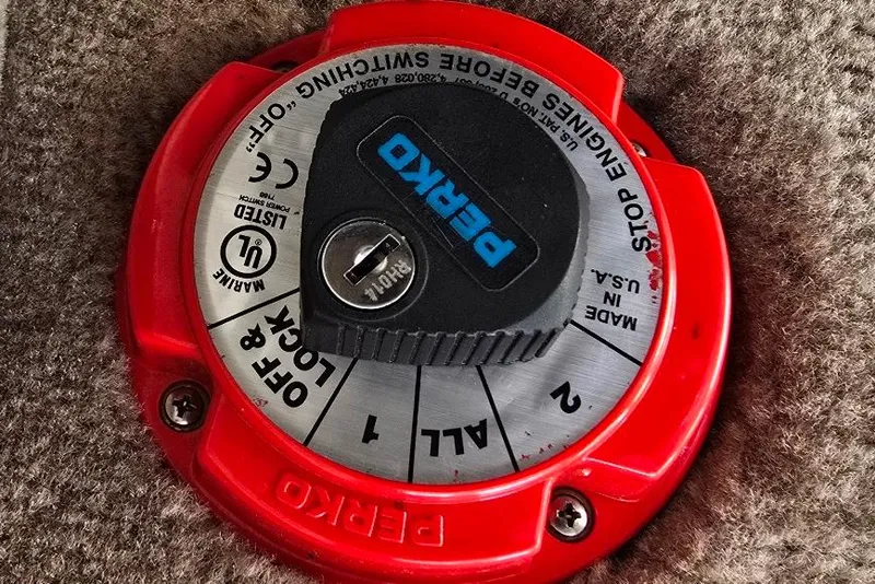 Slide: The Image of Red Perko marine battery switch on 2012 Crownline Eclipse E4 boat. - 25