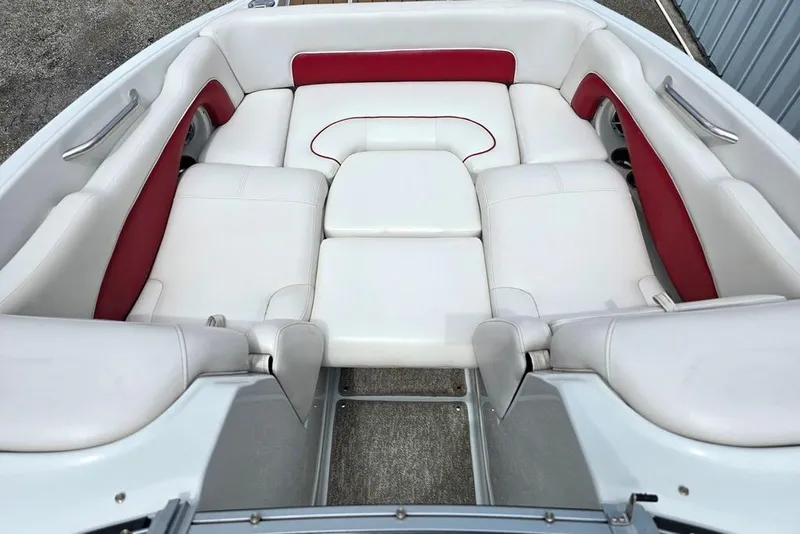 Slide: The Image of 2012 Crownline Eclipse E4 boat interior with white and red seating. - 5