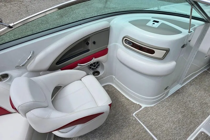 Slide: The Image of Interior of 2012 Crownline Eclipse E4 boat with white and red seating. - 7