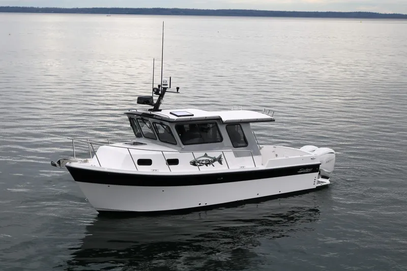 Slide: The Image of 2026 SeaSport Offshore 3000 boat on calm water, showcasing sleek design and modern features. - 4