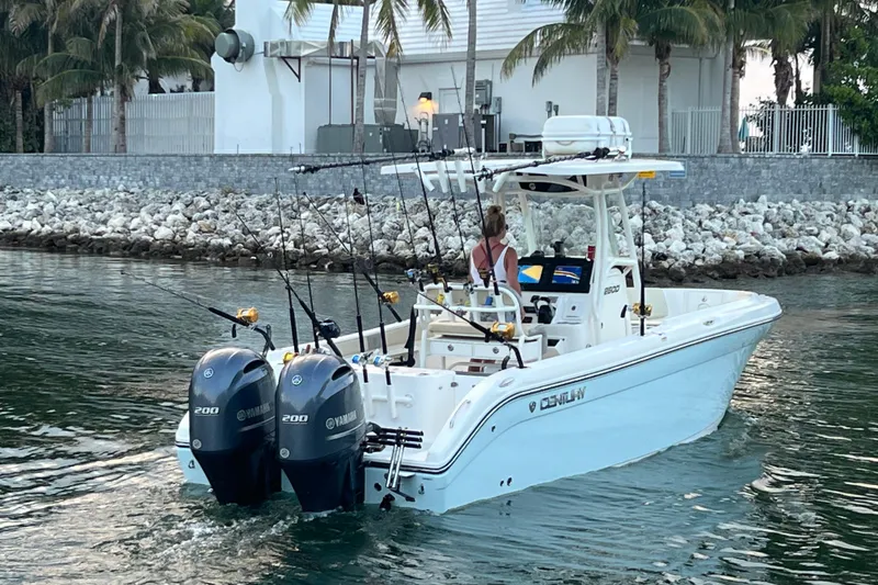 Slide: The Image of 2017 Century 2600 Center Console boat with dual Yamaha engines on water. - 3