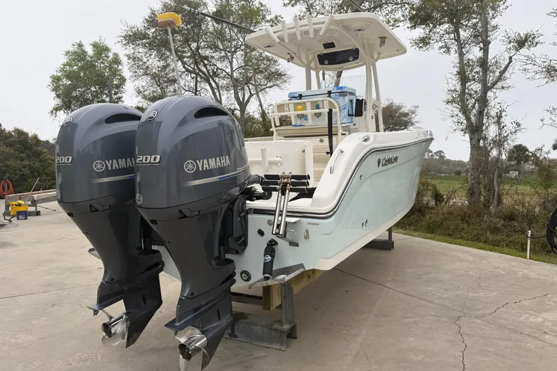 Slide: The Image of 2017 Century 2600 Center Console boat with dual Yamaha 200 engines on display. - 5