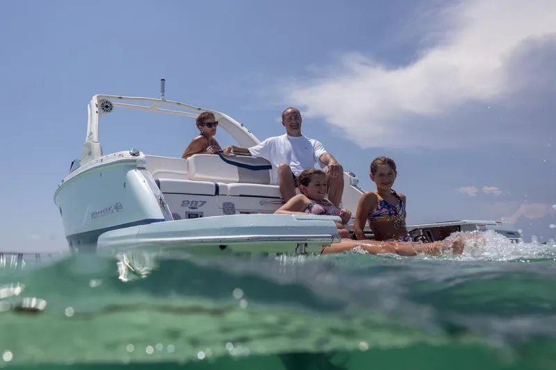 Slide: The Image of Manufacturer Provided Image: 2023 Chaparral 287 SSX boat with people enjoying the water. - 14