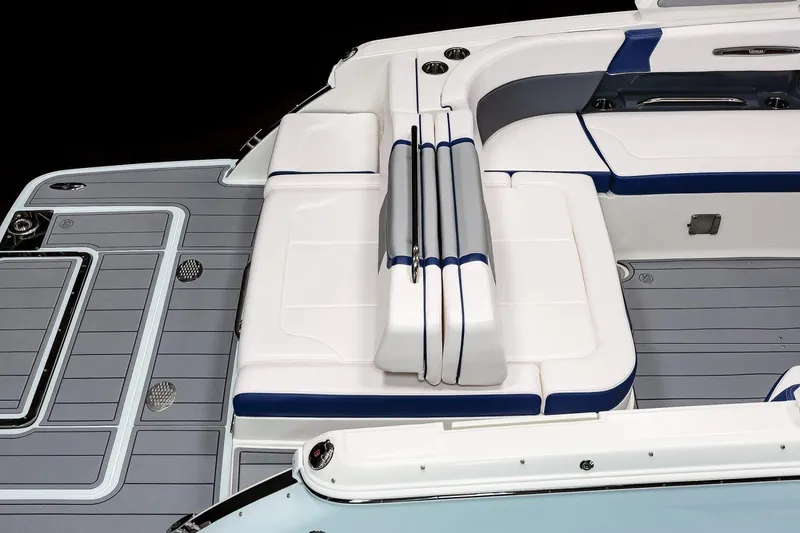 Slide: The Image of Manufacturer Provided Image: 2023 Chaparral 287 SSX boat interior with white and blue seating. - 15