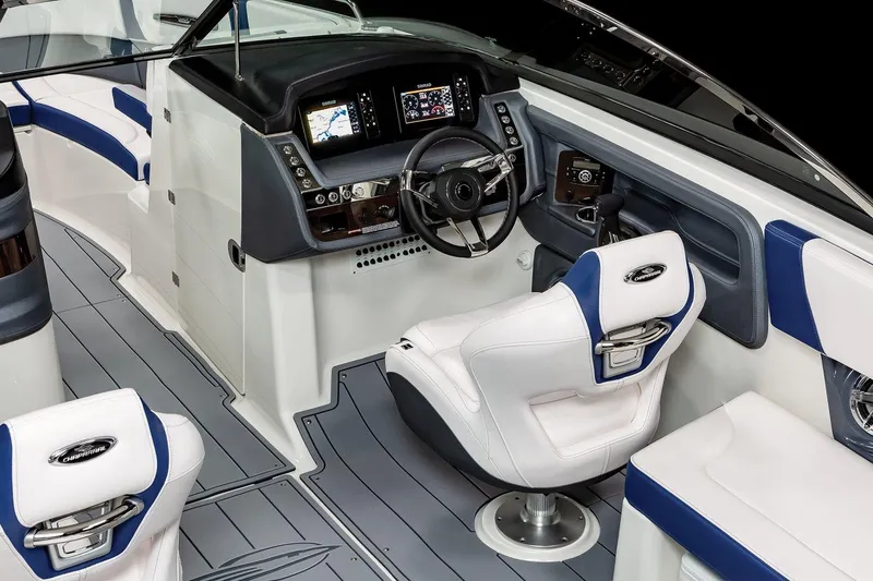Slide: The Image of Manufacturer Provided Image: 2023 Chaparral 287 SSX boat interior with modern dashboard and white seating. - 24