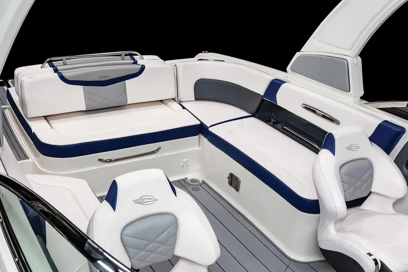 Slide: The Image of Manufacturer Provided Image: 2023 Chaparral 287 SSX boat interior with white and blue seating. - 28