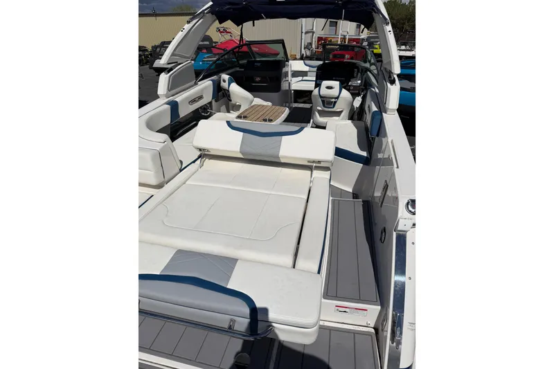 Slide: The Image of 2023 Chaparral 287 SSX boat interior with luxurious seating and modern design. - 3