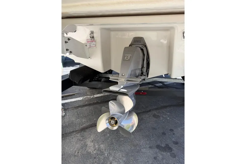 Slide: The Image of 2023 Chaparral 287 SSX boat stern with Volvo Penta outdrive and propeller. - 8