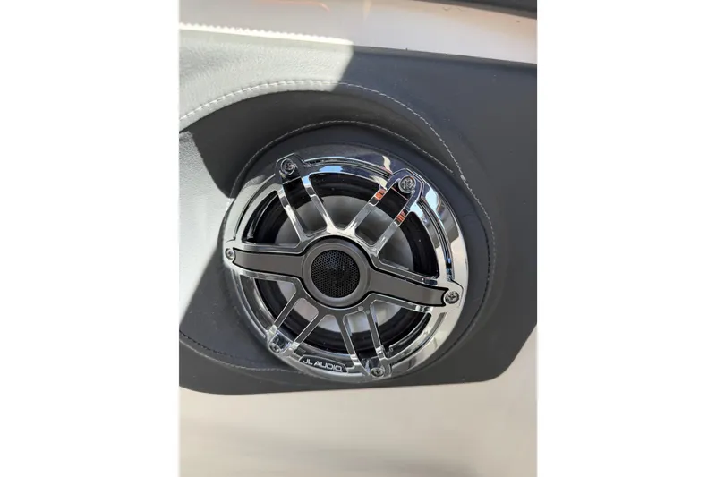 Slide: The Image of 2023 Chaparral 287 SSX boat speaker with chrome grille detail. - 9