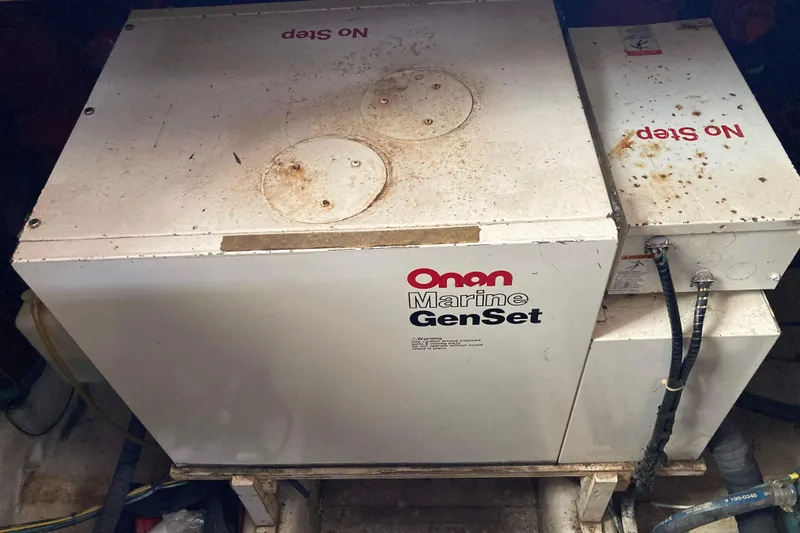 Slide: The Image of Onan Marine GenSet in 1988 Albin 43 Trawler engine room, labeled "No Step." - 46