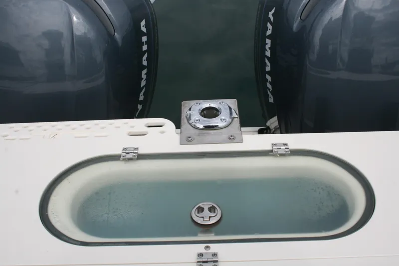 Slide: The Image of 2005 Pursuit 3070 Offshore boat with Yamaha engines and livewell. - 19