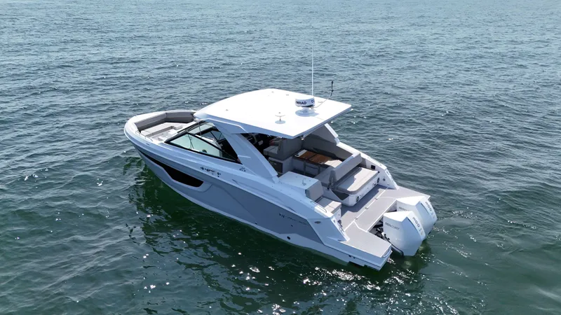 Slide: The Image of 2025 Cruisers Yachts 34 GLS Outboard on open water. - 5