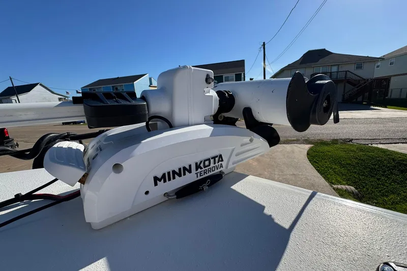 Slide: The Image of Minn Kota Terrova trolling motor on 2016 NauticStar 231 Coastal boat, sunny day. - 23