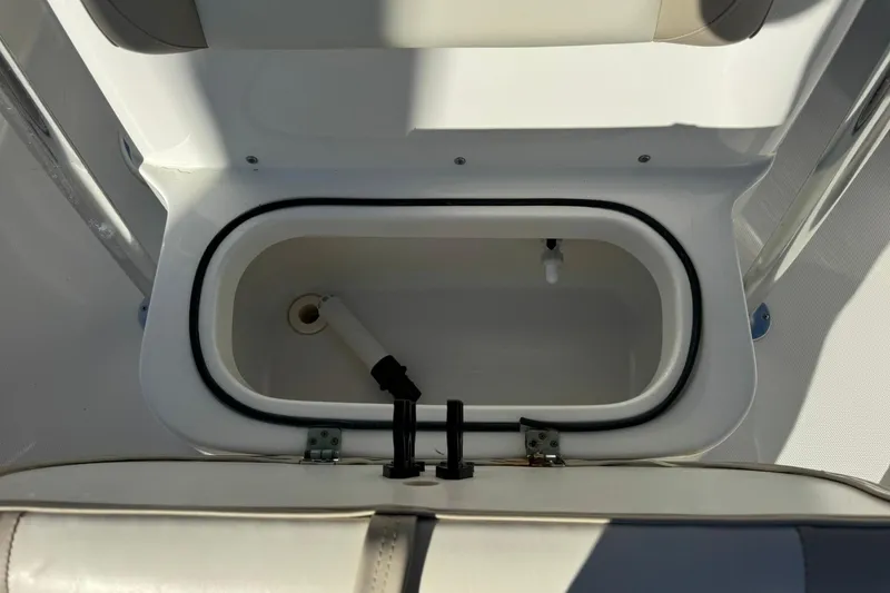 Slide: The Image of Livewell compartment on a 2016 NauticStar 231 Coastal boat, open and empty. - 26