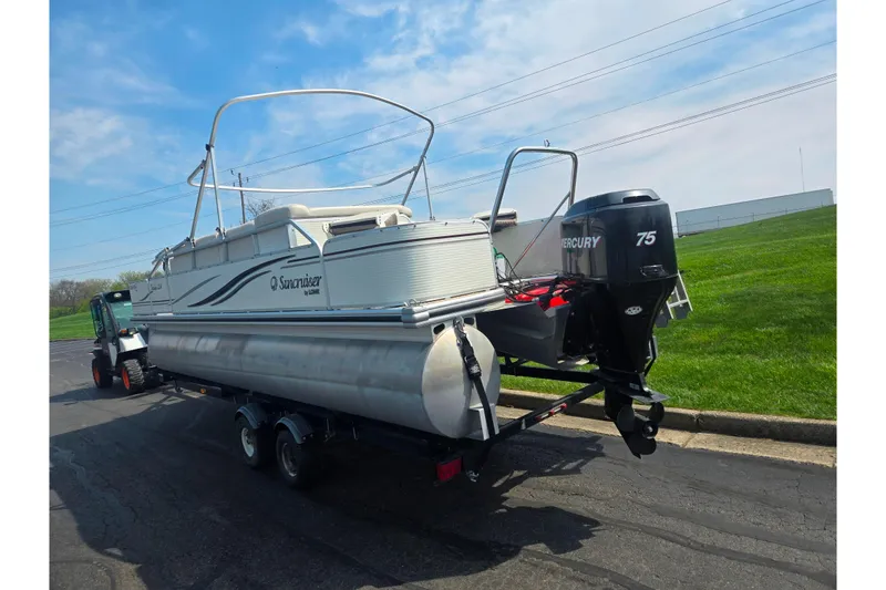 Slide: The Image of 2006 Suncruiser Trinidad 220 pontoon boat on trailer with Mercury 75 outboard motor. - 3