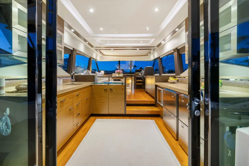 Slide: The Image of Luxurious 2015 Tiara Yachts interior with modern kitchen and elegant design. - 22