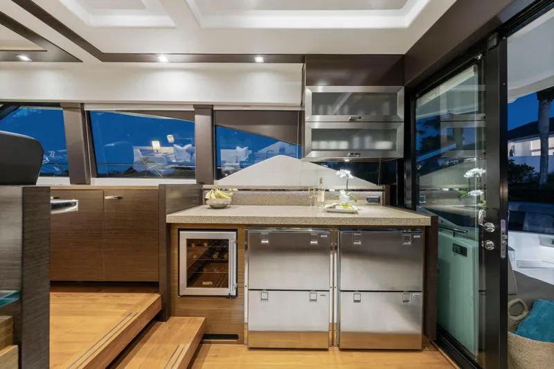 Slide: The Image of Luxurious 2015 Tiara Yachts interior kitchen with modern design and stainless steel appliances. - 25