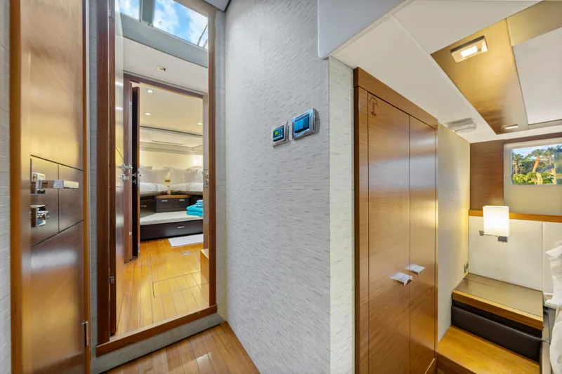 Slide: The Image of Luxurious interior of a 2015 Tiara Yachts, featuring elegant wood finishes and modern design. - 37