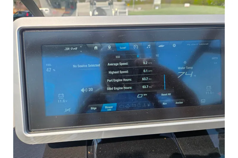 Slide: The Image of Dashboard display of 2023 Yamaha Boats 252XE showing speed, engine hours, and water temperature. - 17