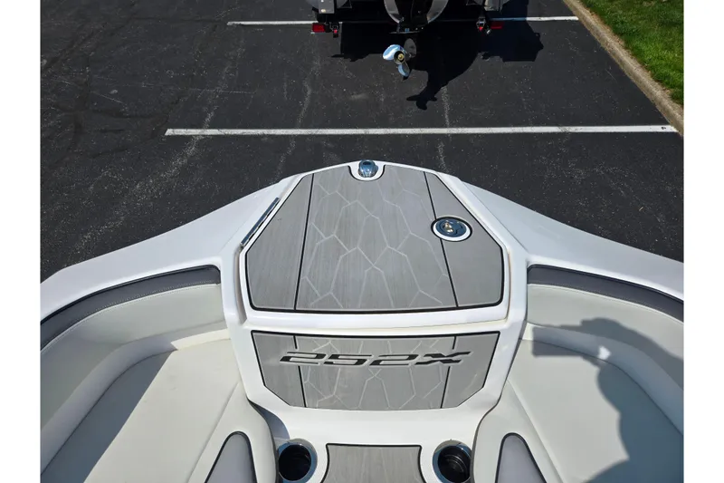 Slide: The Image of 2023 Yamaha Boats 252XE bow view, showcasing sleek design and modern features. - 19