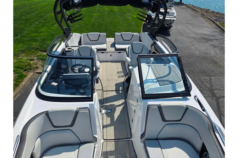 Slide: The Image of 2023 Yamaha Boats 252XE interior with sleek seating and modern design. - 21
