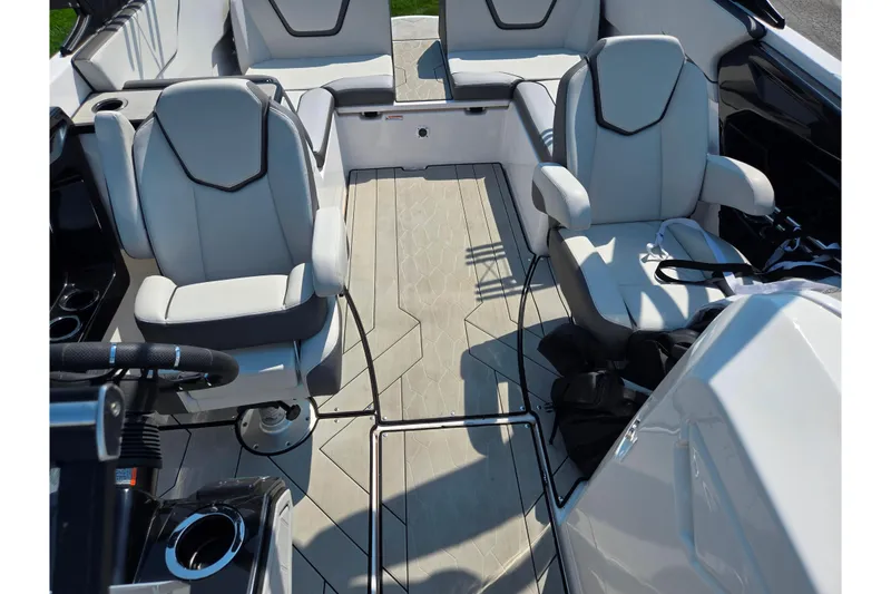 Slide: The Image of 2023 Yamaha Boats 252XE interior with sleek seating and modern design. - 22