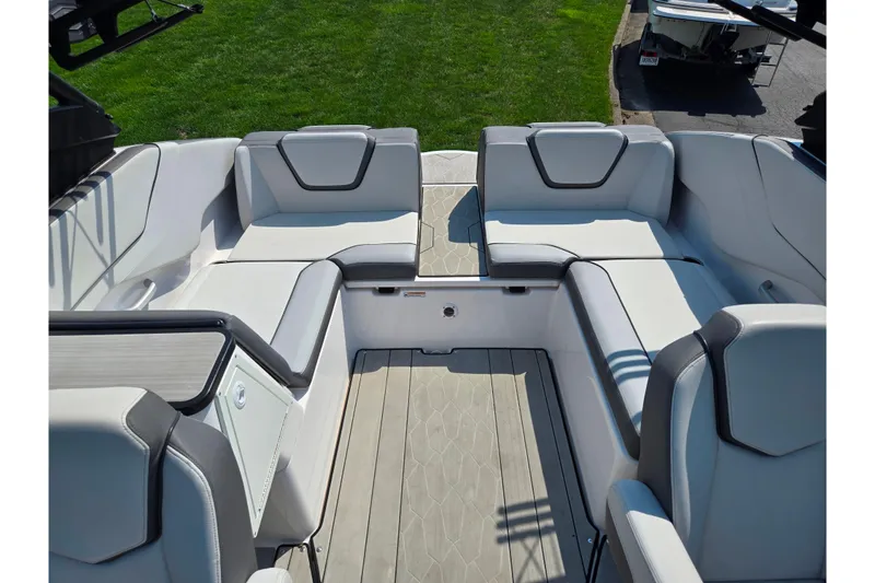 Slide: The Image of 2023 Yamaha Boats 252XE interior with luxurious seating and modern design. - 23