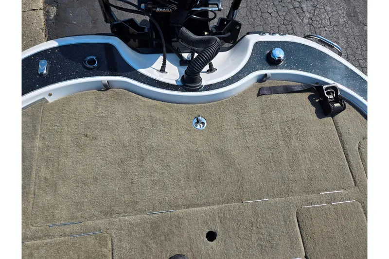 Slide: The Image of 2016 Legend Alpha 211R DC boat deck with carpet and control panel. - 23