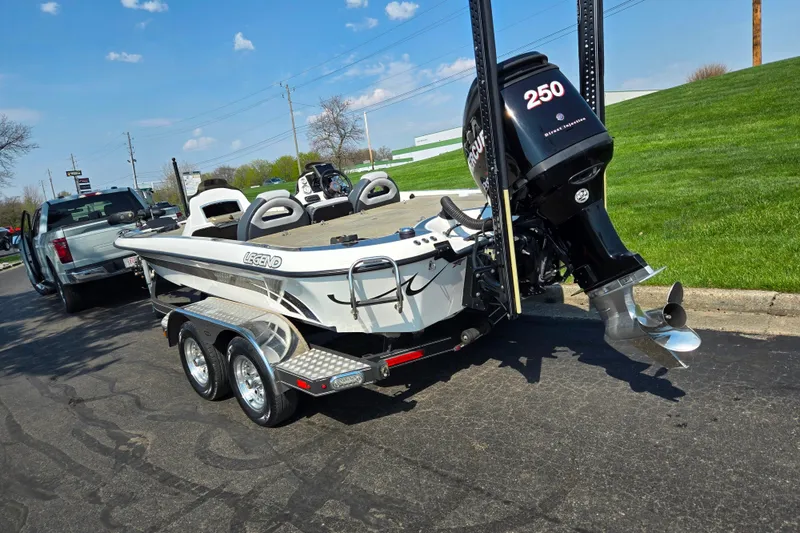 Slide: The Image of 2016 Legend Alpha 211R DC boat on trailer with powerful outboard motor. - 3