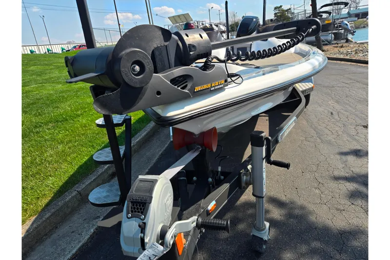 Slide: The Image of 2016 Legend Alpha 211R DC boat on trailer with Minn Kota trolling motor. - 6