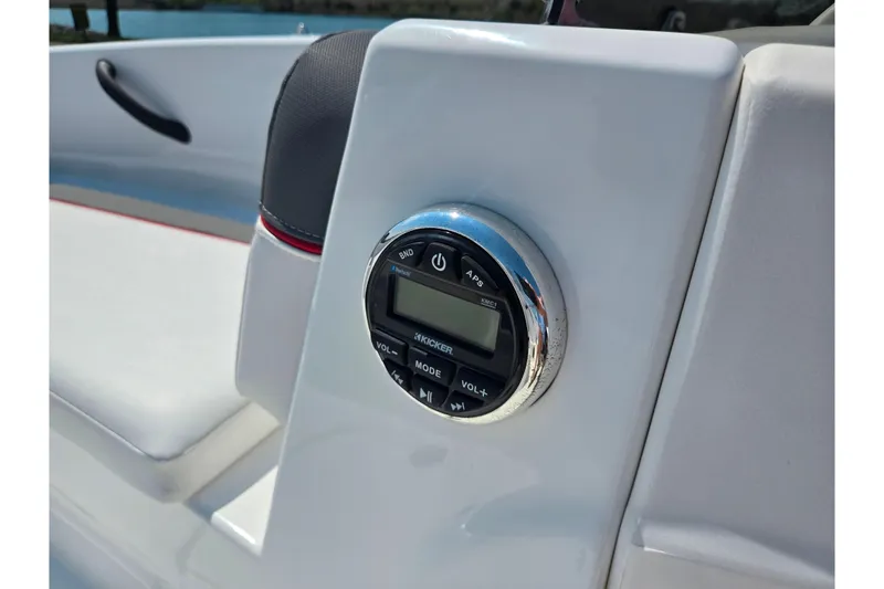 Slide: The Image of 2024 Tahoe T16 boat dashboard with audio control panel. - 14