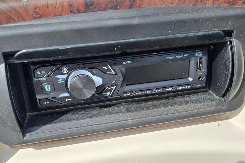 Slide: The Image of Jensen media player in 2007 South Bay 8522 CR E series boat dashboard. - 11