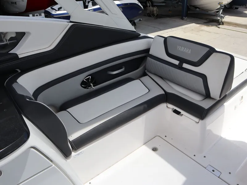 Slide: The Image of Interior of a 2020 Yamaha Boats 275SD with stylish seating. - 19