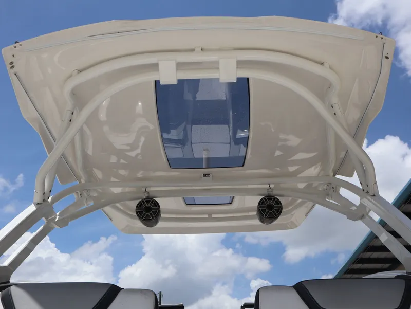 Slide: The Image of 2020 Yamaha Boats 275SD with canopy and speakers. - 24