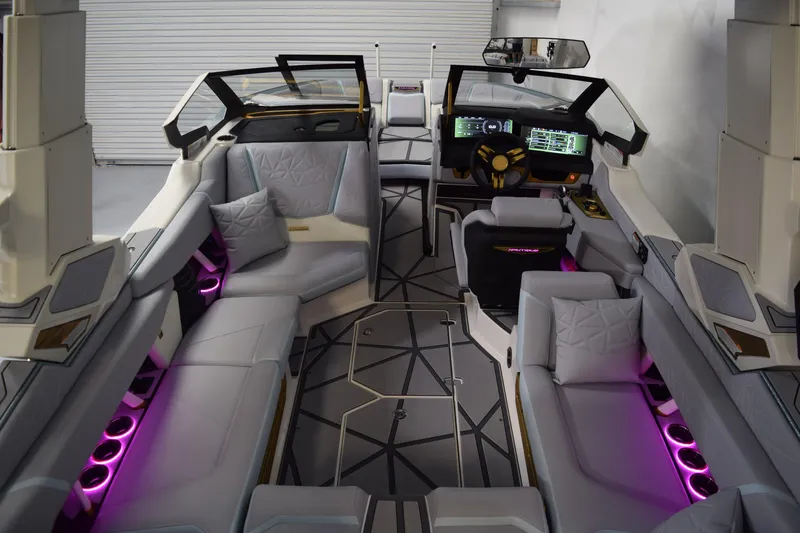 Slide: The Image of Luxurious interior of 2026 Nautique Super Air Nautique G25 Paragon with ambient lighting. - 10
