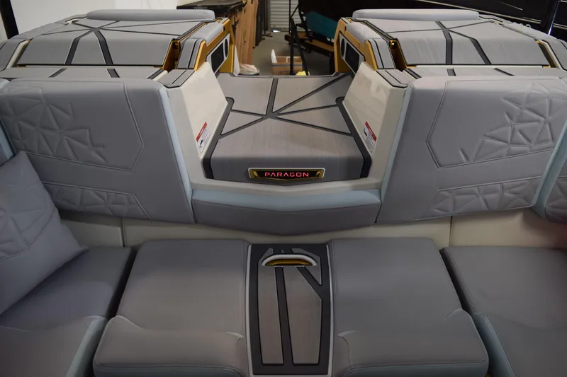 Slide: The Image of Interior of 2026 Nautique Super Air Nautique G25 Paragon with luxurious seating. - 15