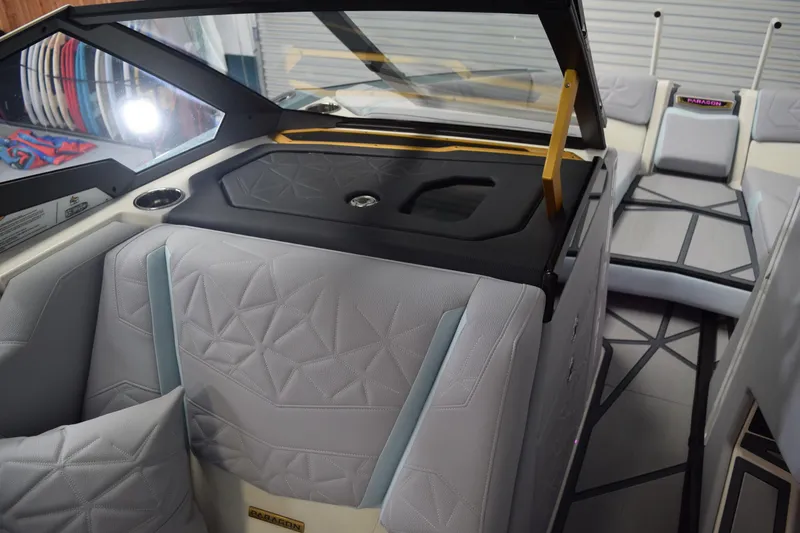 Slide: The Image of Interior of 2026 Nautique Super Air Nautique G25 Paragon, featuring luxurious seating and modern design. - 16