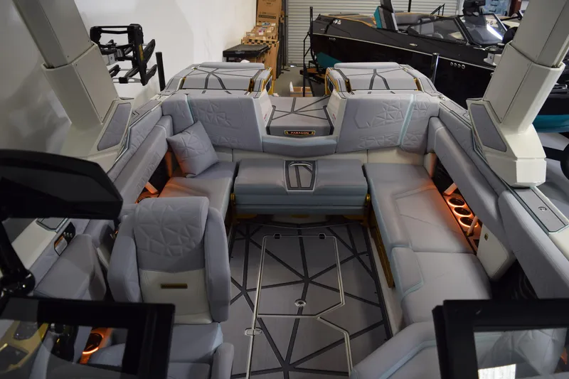 Slide: The Image of Luxurious interior of 2026 Nautique Super Air Nautique G25 Paragon boat with plush seating. - 24