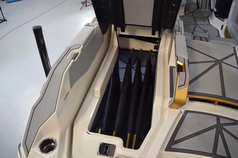 Slide: The Image of 2026 Nautique Super Air Nautique G25 Paragon interior storage compartment with sleek design. - 28