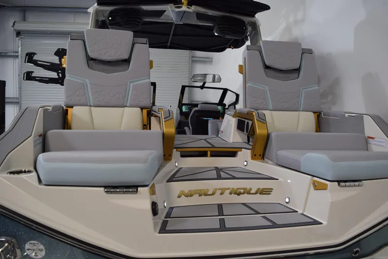Slide: The Image of 2026 Nautique Super Air Nautique G25 Paragon interior with luxurious seating and modern design. - 7