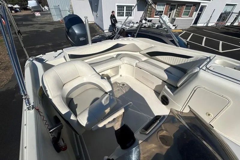 Slide: The Image of 2009 SouthWind 210 SD boat interior with seating and Yamaha 150 engine. - 14