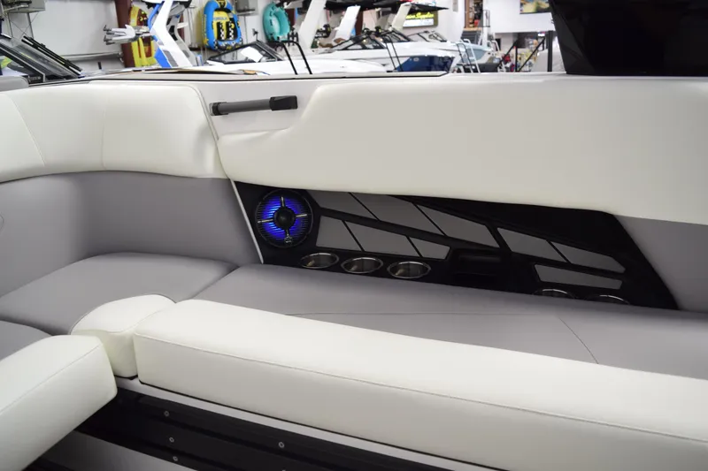 Slide: The Image of Interior of 2026 Moomba Tykon boat with sleek seating and modern speaker system. - 14